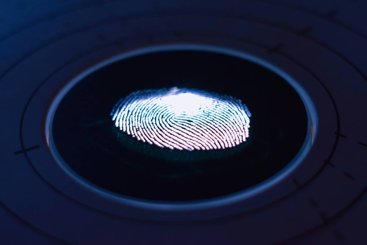 Fingerprint on black background eletronic digital
